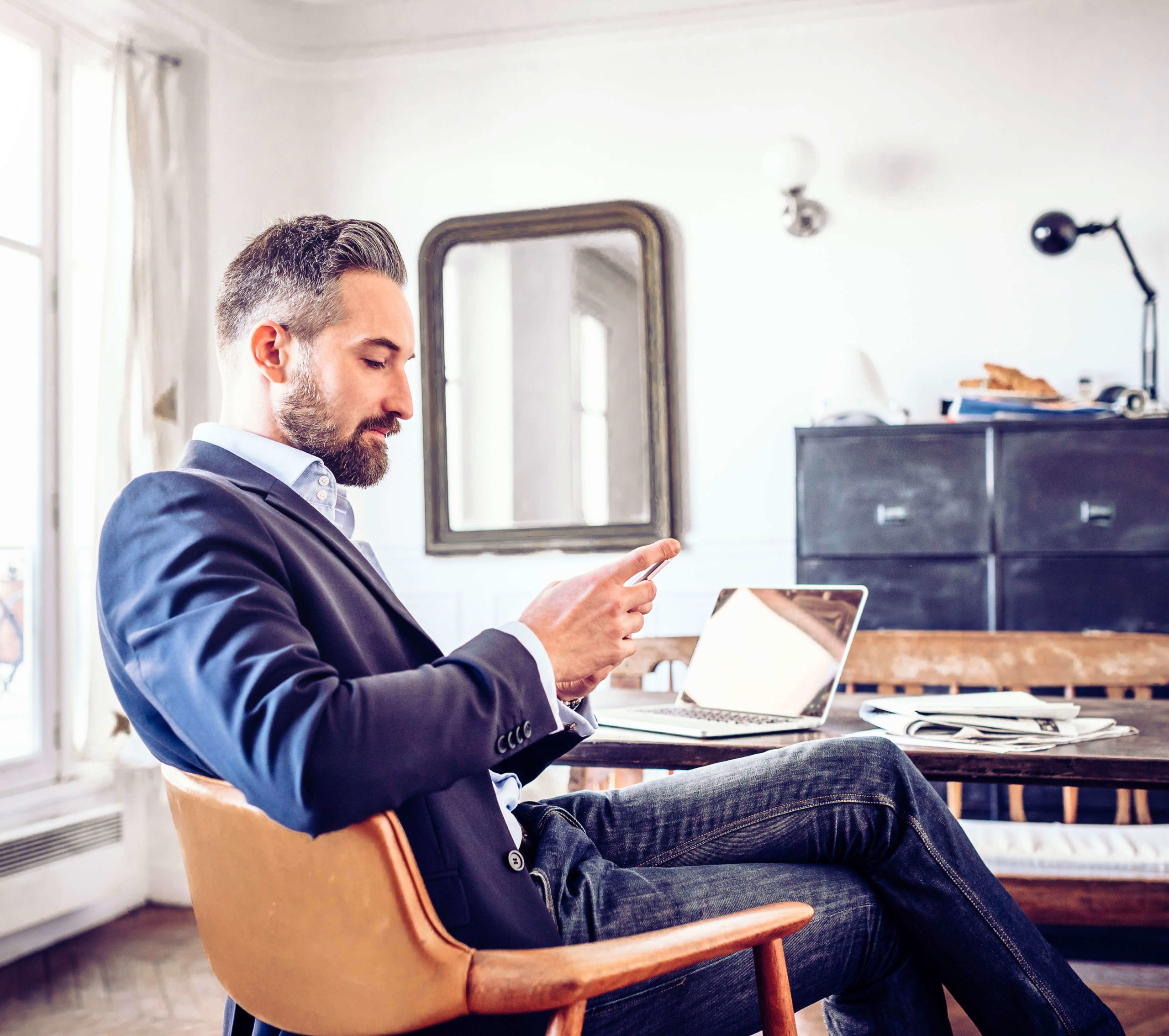 Man at his office learning about Mirenda & associates